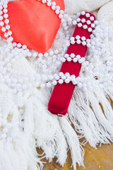 red heart, gift case and beads from pearls