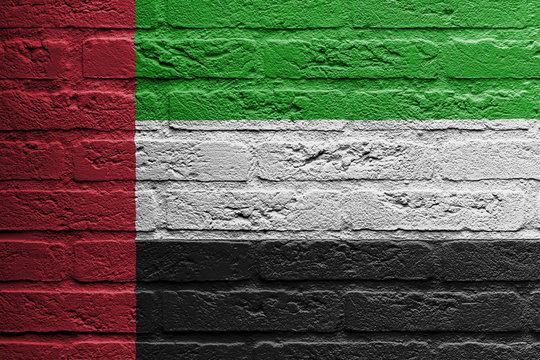 Brick wall with a painting of a flag, The United Arab Emirates