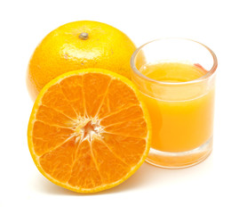 Orange juice and oranges isolated on white background