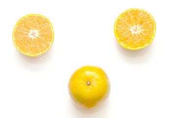 Orange juice and oranges isolated on white background