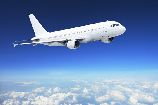Fototapeta Airplane in the sky - Passenger Airliner / aircraft