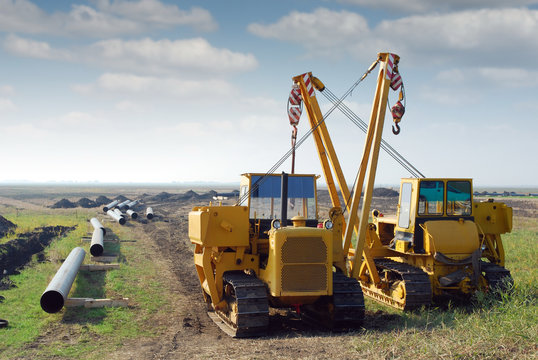 heavy machinery and gas pipeline construction site