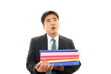 疲れた表情のビジネスマン