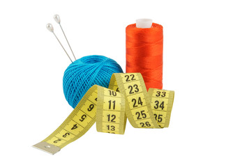 Yellow measuring tape and threads isolated