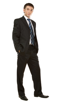 businessman posing in a suit isolated in white