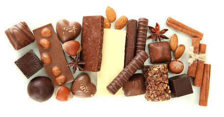Chocolate and sweets isolated on white