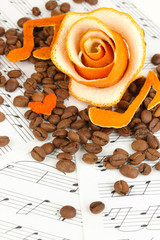 Decorative rose from dry orange peel with coffee beans