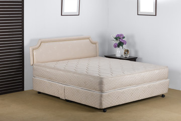 Nice and luxury bedding mattress in a set up bedroom atmosphere