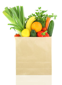 Fresh Vegetables And Fruits In A Paper Grocery Bag