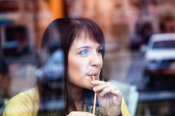 Beautiful girl in a cafe