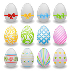 set of white eggs with ribbons and patterns