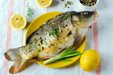 Fresh carp with lemon