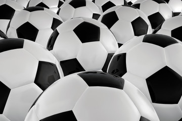A cluster of soccer balls.