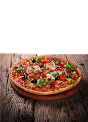 Delicious italian pizza served on wooden table