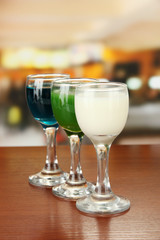 Tasty color liquors, on bright background
