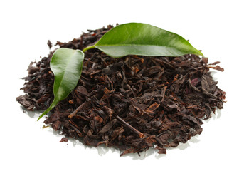 Dry black tea with green leaves, isolated on white