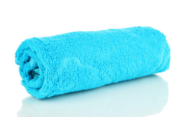 Rolled up blue towel isolated on white