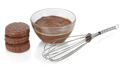 Bowl of chocolate and sweets isolated on white