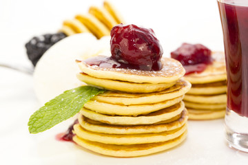 sweet little pancakes with blackberry jam
