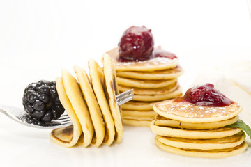 sweet little pancakes with blackberry jam