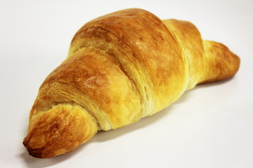 Butter croissant on a white background