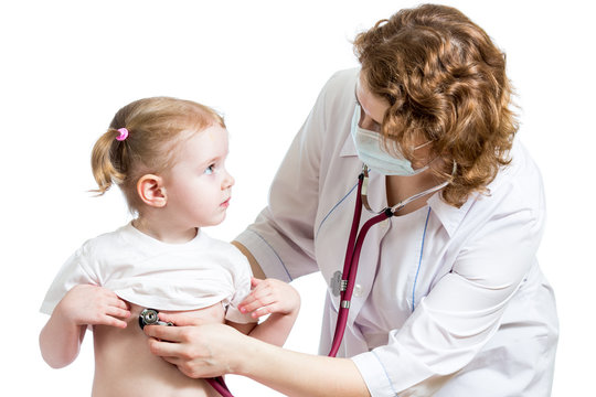 doctor examining kid girl isolated on white