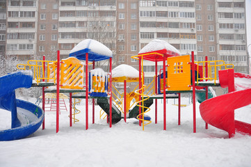 Fototapeta na wymiar Playground structure during a snowfall, Moscow, Russia