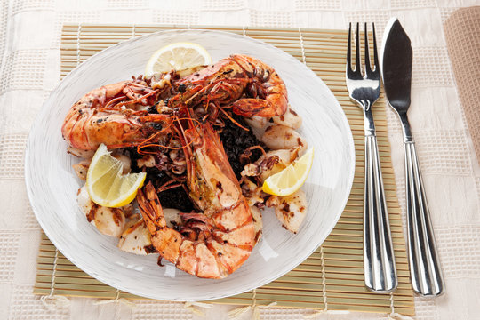 Jumbo prawns and grilled squids with black rice