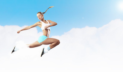 Fototapeta premium Image of sport woman jumping