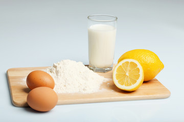 Milk in a glass jar and eggs