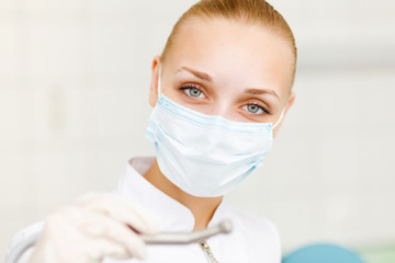 A portrait of a dental worker