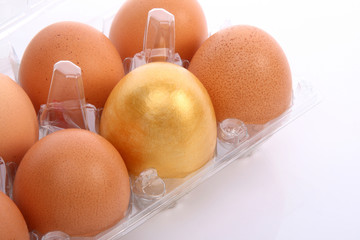 Golden egg in a box © bluebat