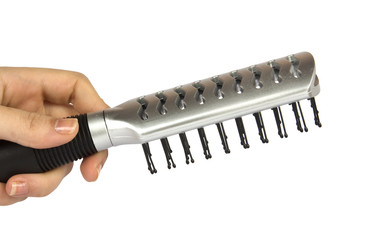 Obraz premium HAIRBRUSH IN HAND