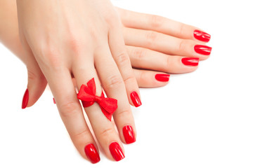 hands with red manicure isolated