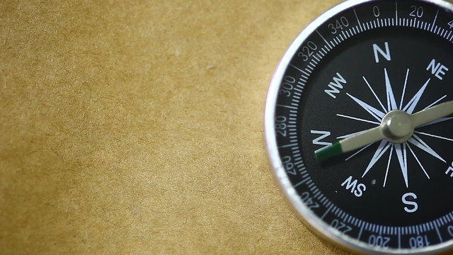 Black compass pointing north.