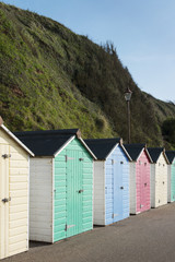Fototapeta na wymiar Colorful Beach Huts w Seaton, Devon, Wielka Brytania.