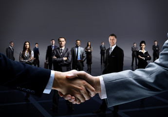 handshake isolated on business background