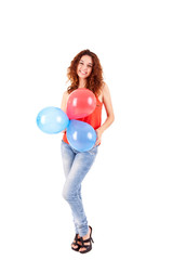 Happy beautiful woman holding balloons