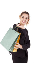 Lovely woman with shopping bags over white