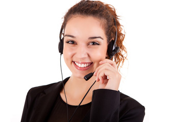 Portrait of a happy young call center employee smiling with a he
