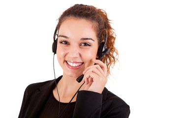 Portrait of a happy young call center employee smiling with a he