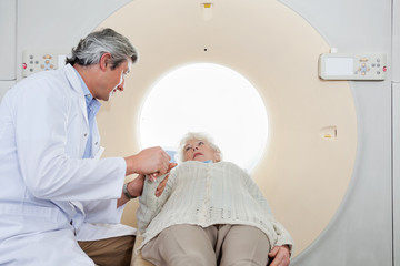 Radiologist Comforting Patient Before CT Scan