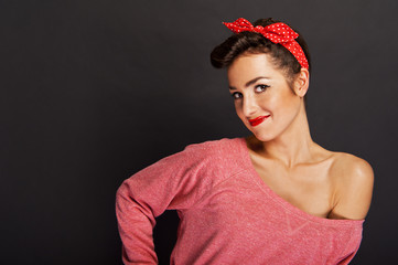 Pin-up woman with big smile on black background