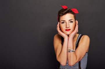 Naklejka premium Pin-up woman with big smile on black background