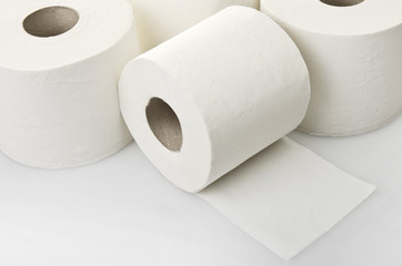 Rolls of toilet paper close up on white