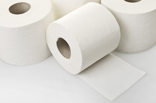 Rolls of toilet paper close up on white