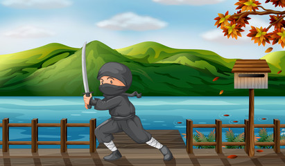 A gray ninja with a sharp sword near the wooden mailbox © GraphicsRF
