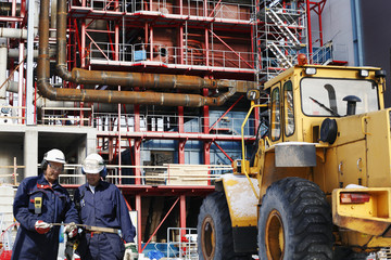 Fototapeta premium workers, bulldozer and construction plant