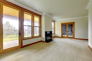 Empty large room with fireplace. New luxury home interior.
