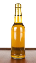 BOTTLE ON WOOD BACKGROUND